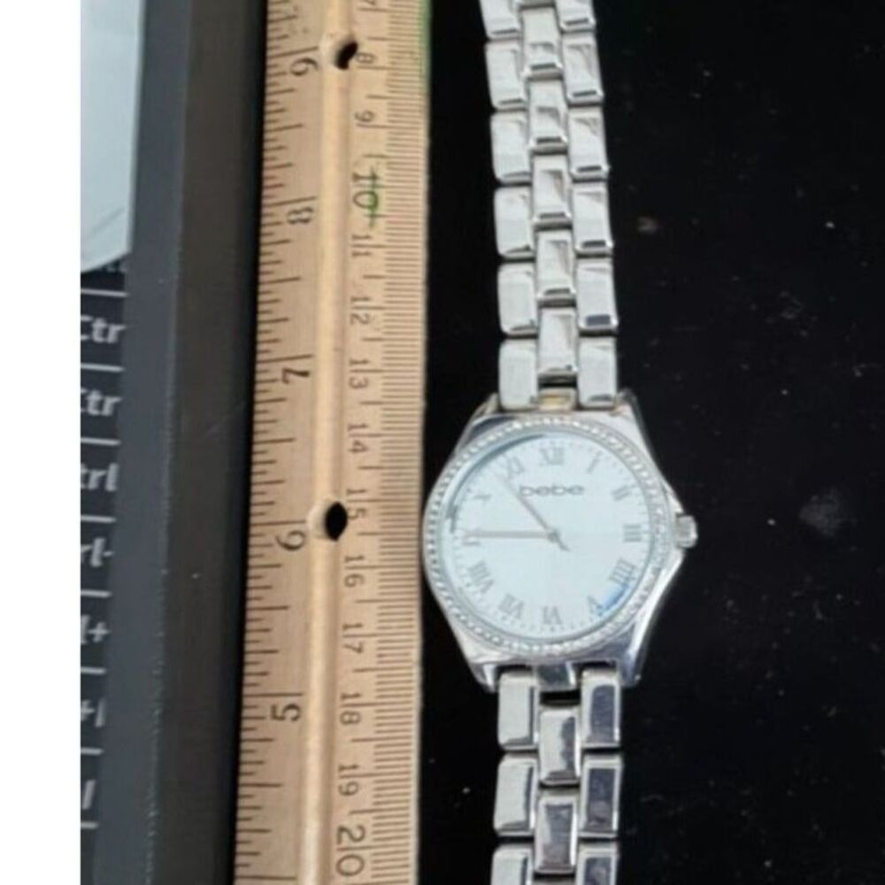 Bebe women's silver tone watch with roman numeral dial